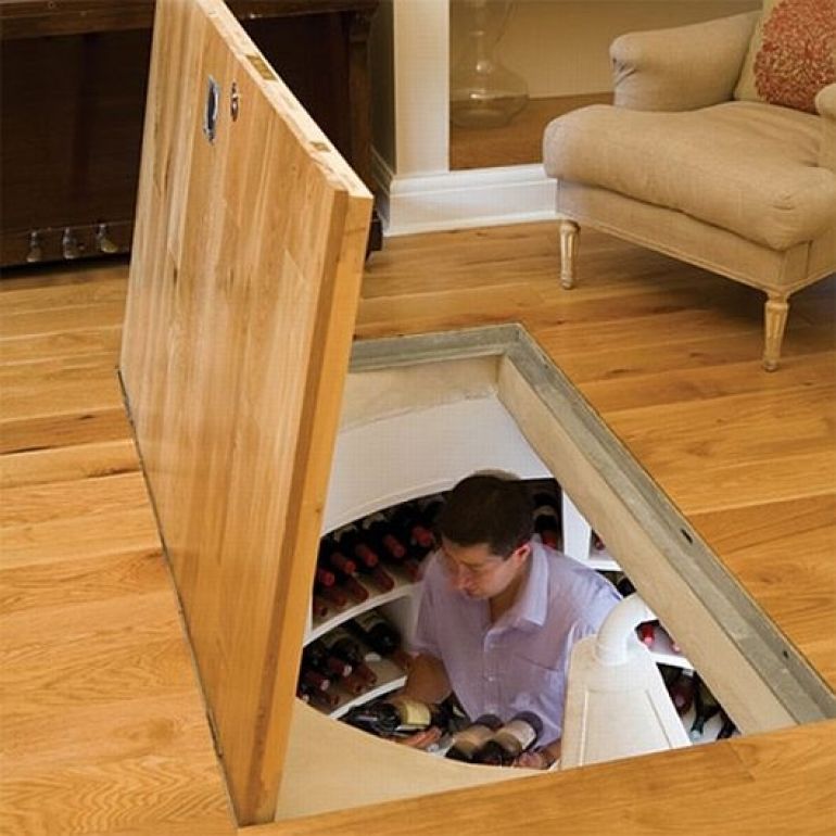 Hidden wine cellar under living area