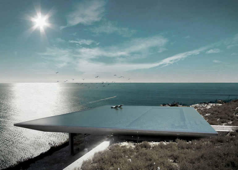 Mirage House's pool reflects the sky to blend in with the ocean beyond