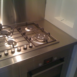 Stainless steel benchtop with cooktop